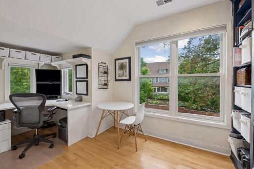 Bright upper level room makes an ideal office, homework or creative space