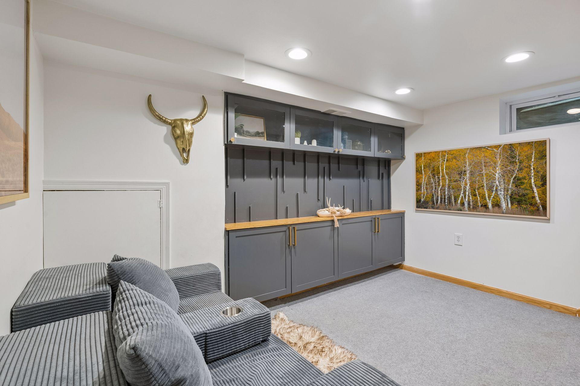 Flexible, living space with custom built-ins offer room to relax, work or entertain