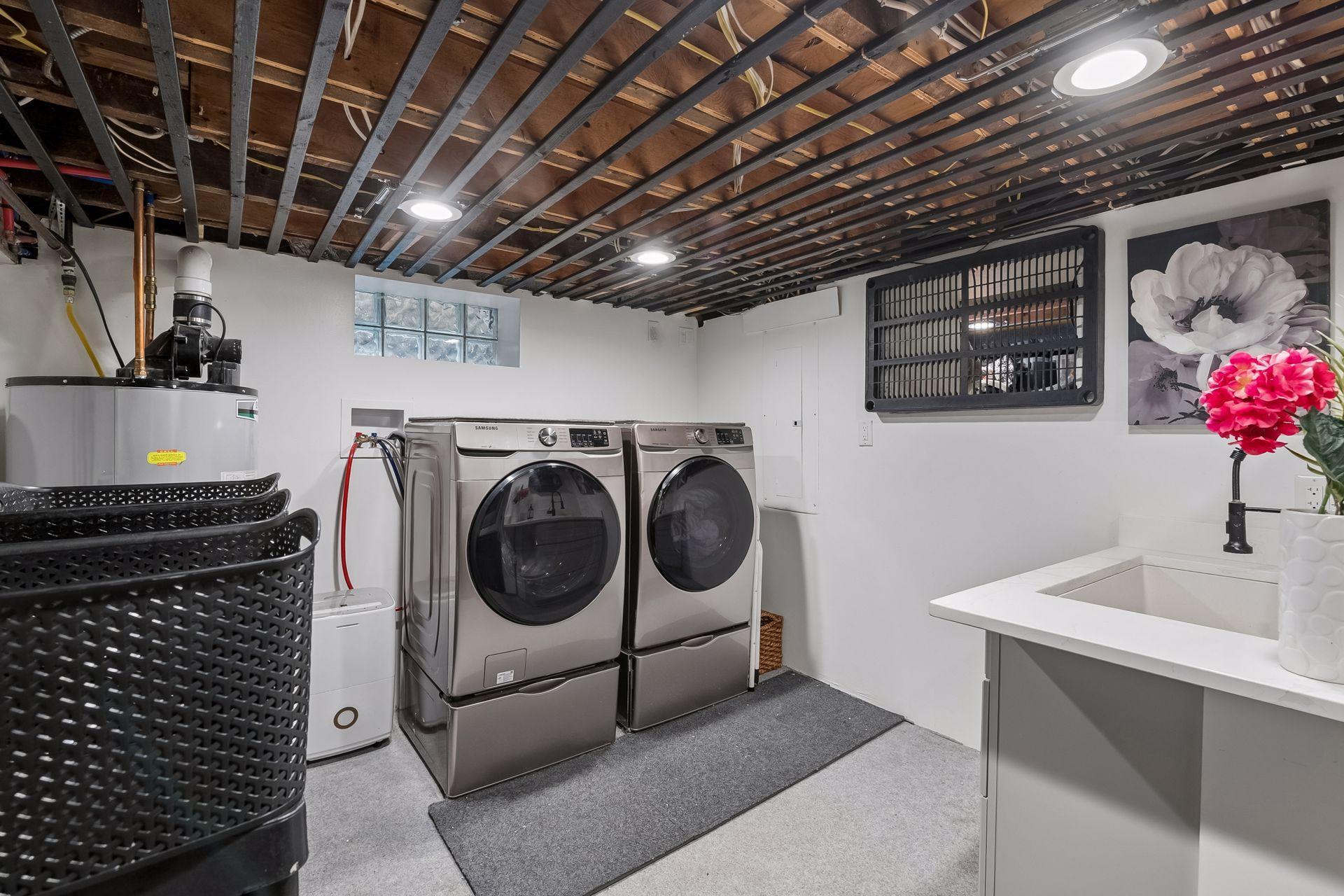 Dedicated laundry area with washer and dryer new in 2021