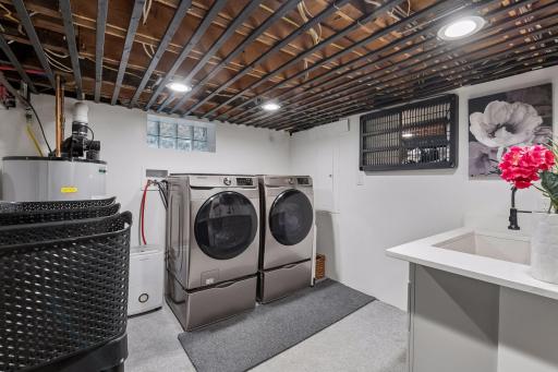 Dedicated laundry area with washer and dryer new in 2021