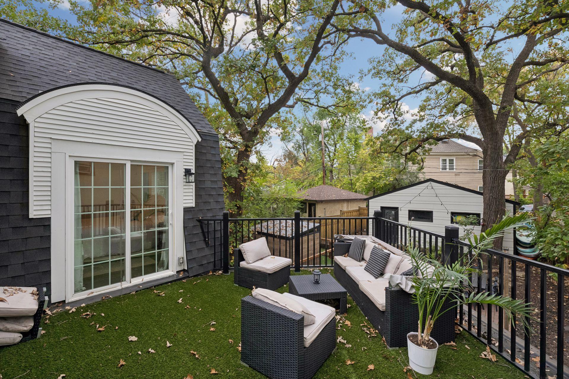 Upper deck offers another private outdoor space overlooking the backyard off of the primary