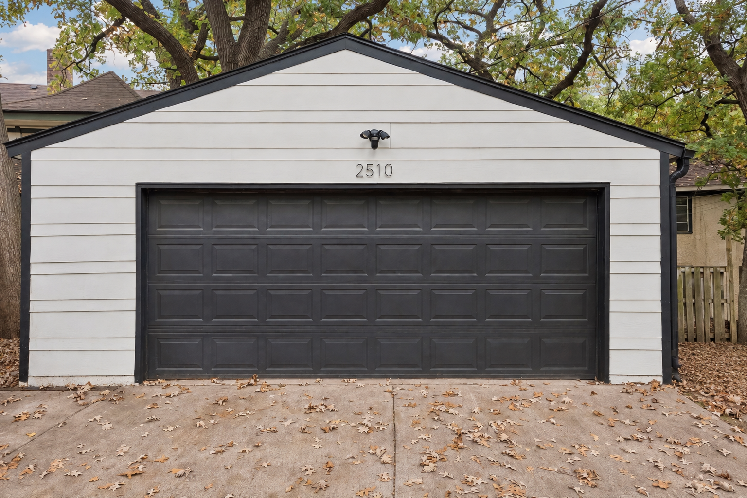 Two car garage includes the level two electric vehicle charger