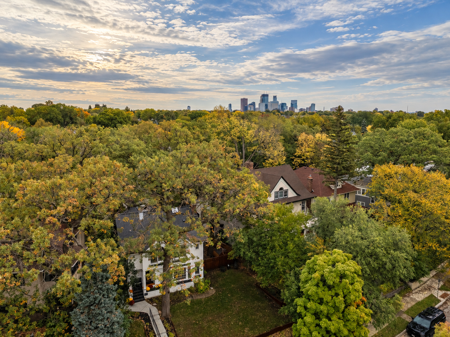 Tucked into the heart of Kenwood with the Minneapolis skyline just beyond the trees.