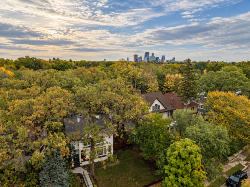 Tucked into the heart of Kenwood with the Minneapolis skyline just beyond the trees.