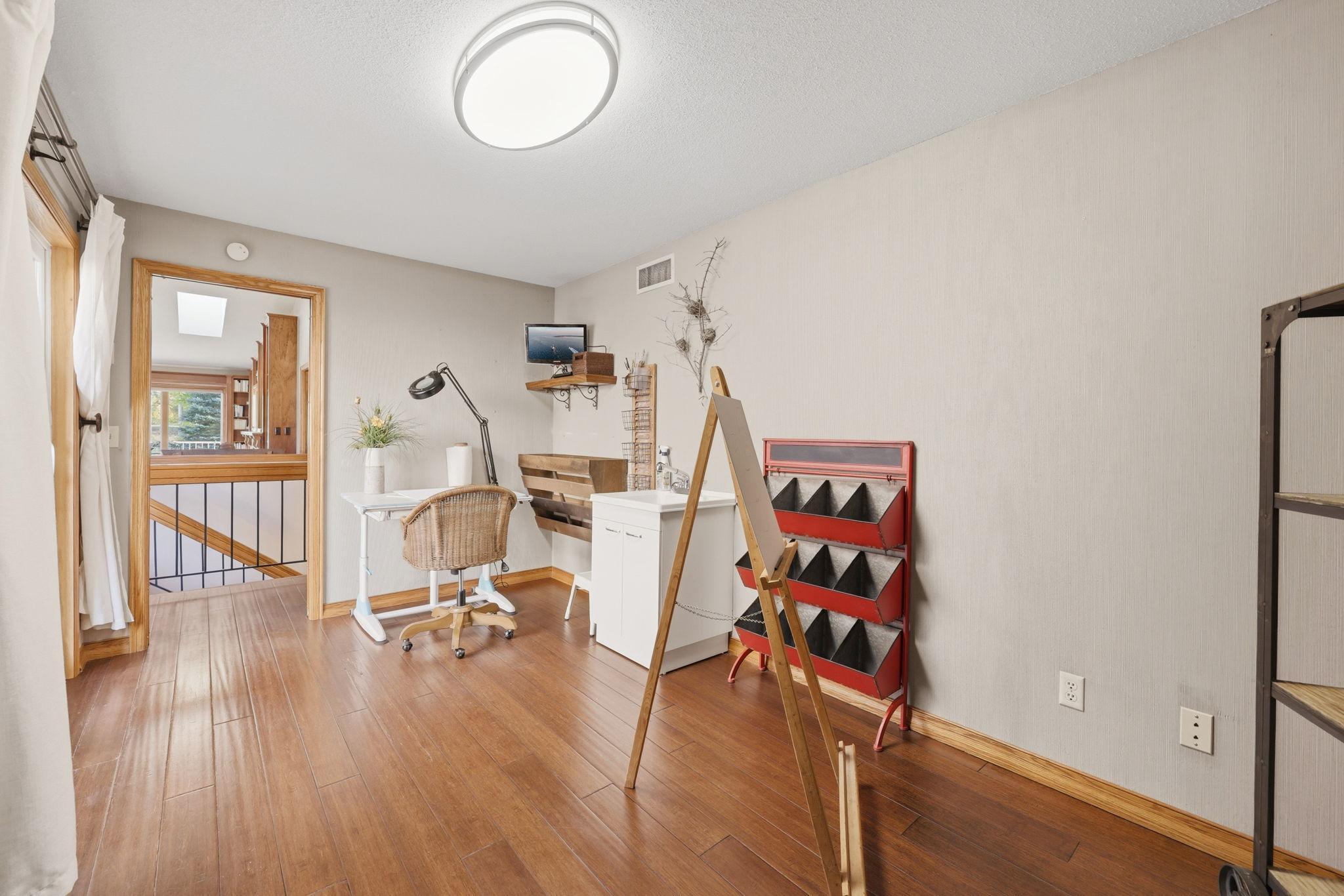 This room is located right off the entrance to the home so you can welcome visitors directly into your art studio.