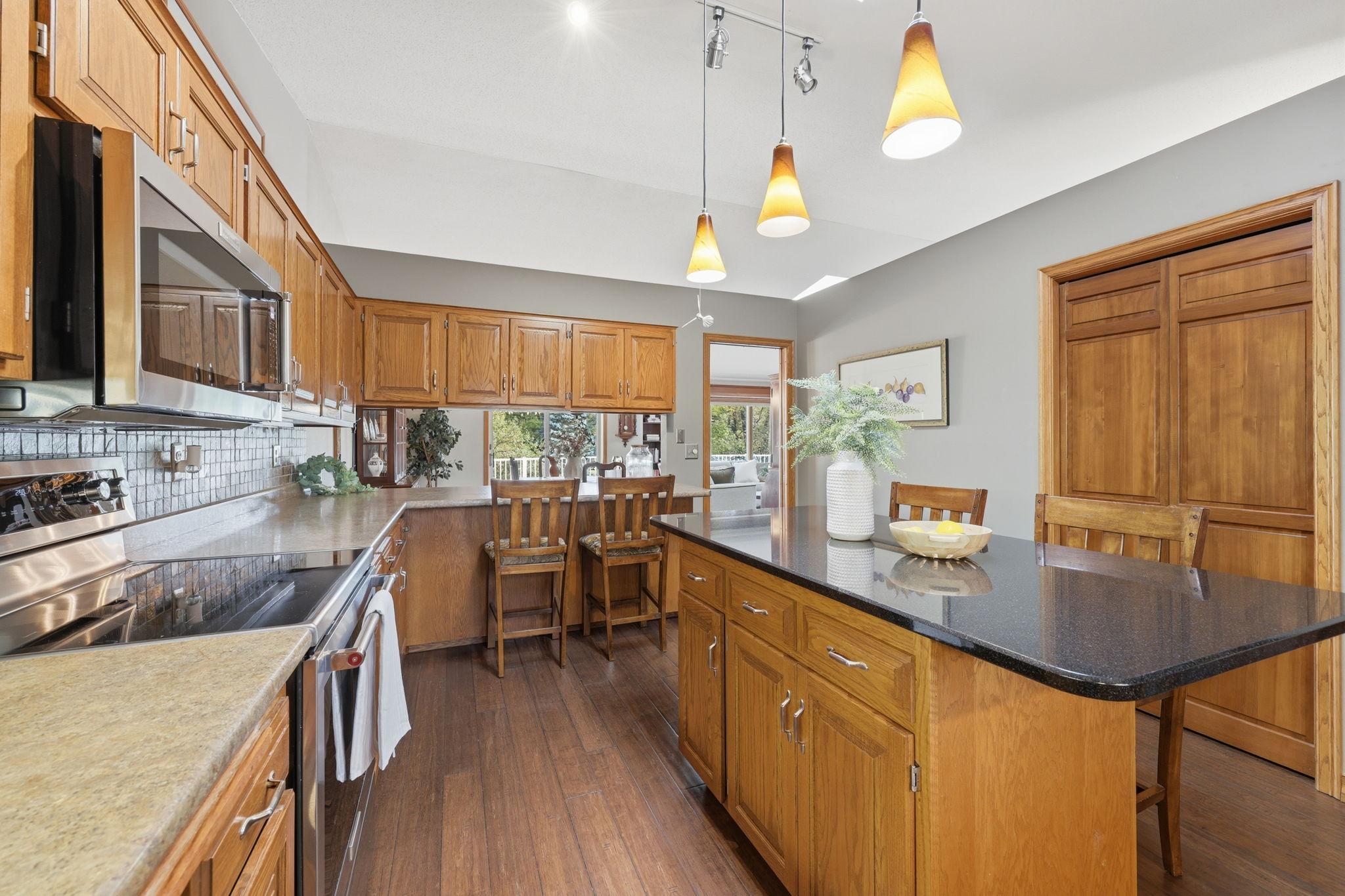 Notice the seating at the counter looking into the dining room also
