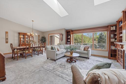 Open floor plan offers views of the outdoor space from your living room and dining room.