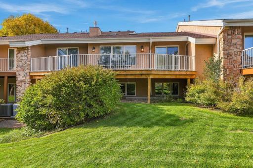 Relax from your deck overlooking the backyard