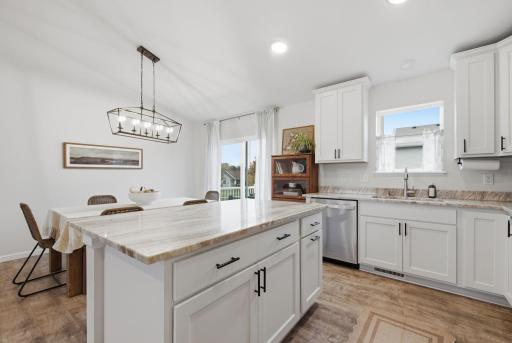 Ample Prep Space and Modern Finishes Throughout