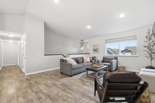 Bright and Inviting Living Room with Vaulted Ceilings