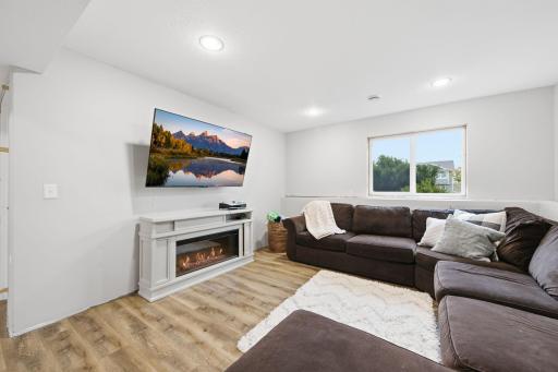 Bright and Inviting Living Room with Vaulted Ceilings