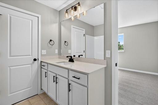 Photo taken of another home with similar plan and finishes.