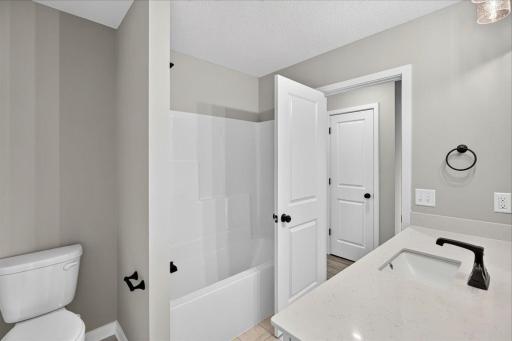 Photo taken of another home with similar plan and finishes.