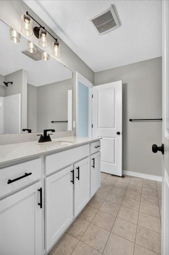 Photo taken of another home with similar plan and finishes.