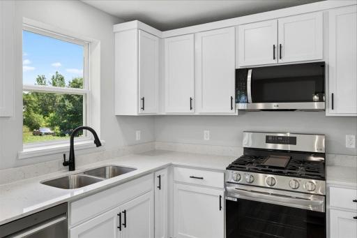 Photo taken of another home with similar plan and finishes.