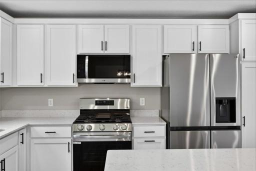 Photo taken of another home with similar plan and finishes.
