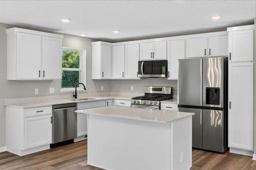 Photo taken of another home with similar plan and finishes.
