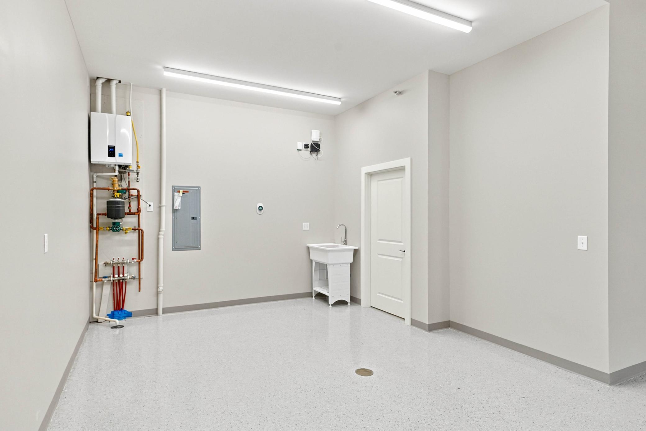This unit is equipped with 150 amp electric service, fiber optic internet, utility sink, and 3/4 bath.