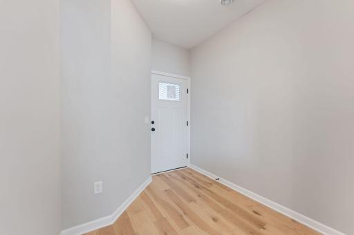 Welcoming entry with space creates a perfect drop zone for guests. Photo is for representational purposes only, not the actual home.