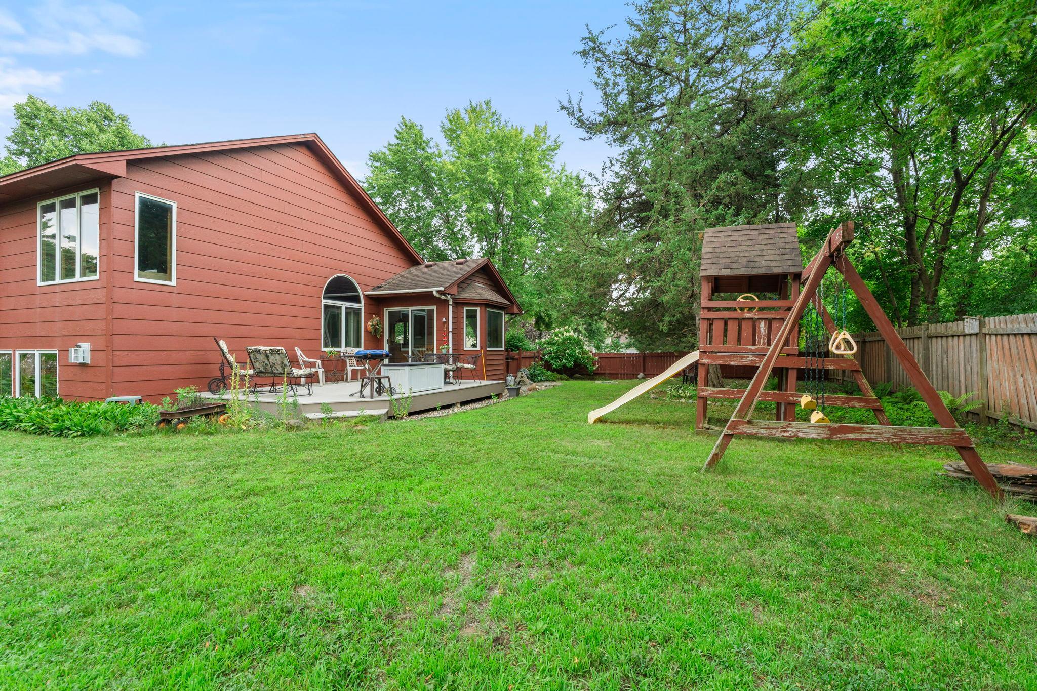 Fenced backyard. Spacious backyard. Play set can stay with the home!
