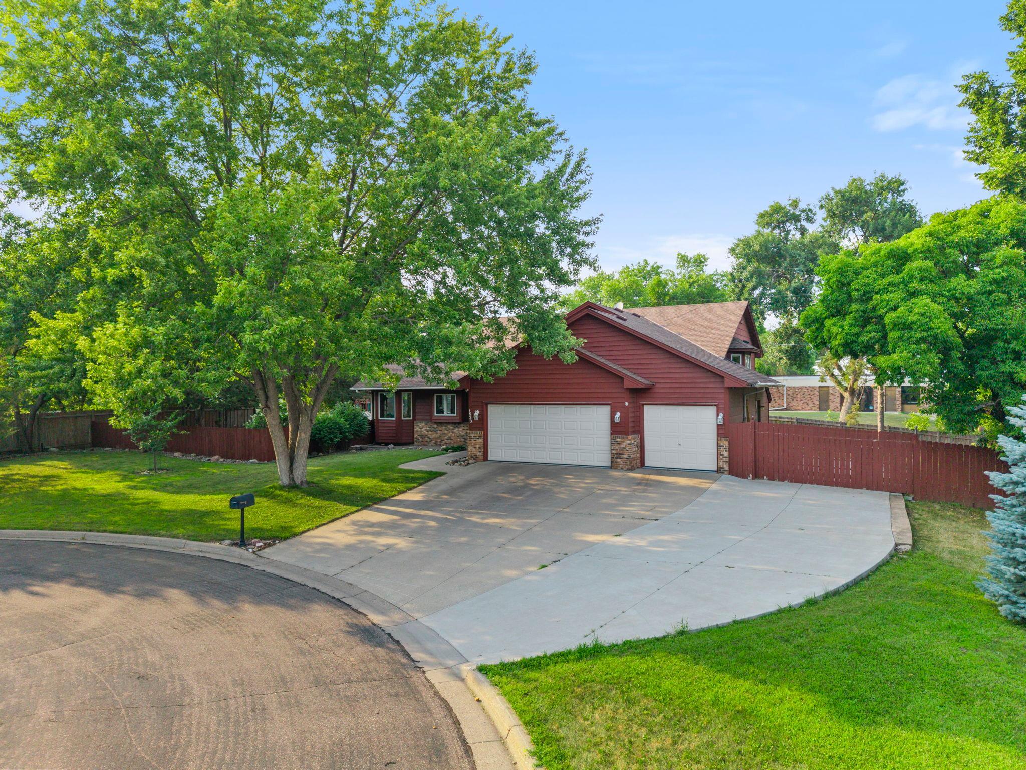 View of expanded concrete driveway