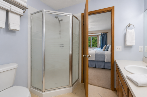 Primary bathroom, separate shower and convenient towel rack