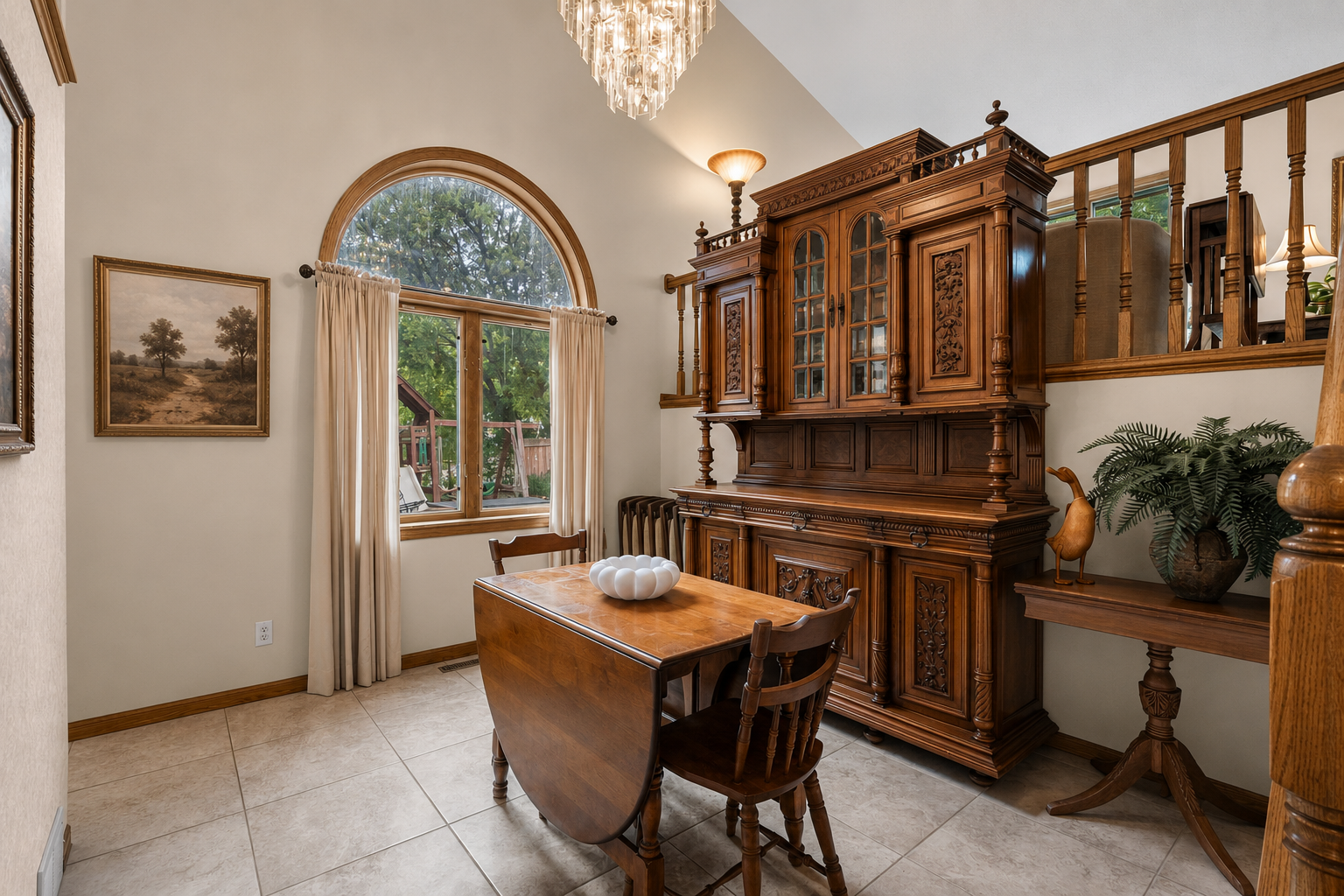 Dining room with vaulted ceilings, chandelier