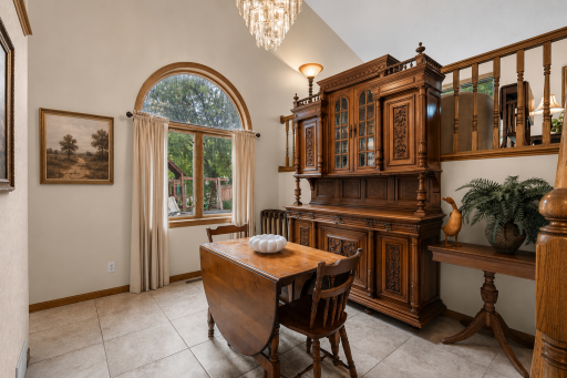 Dining room with vaulted ceilings, chandelier