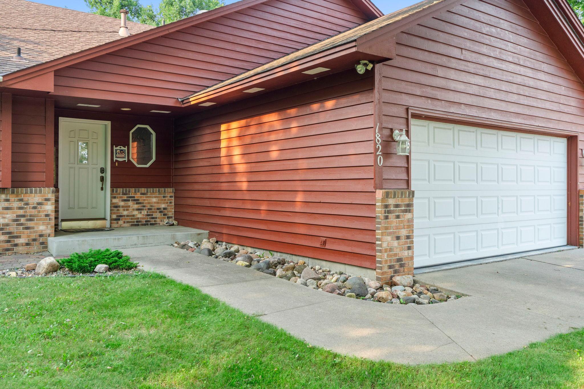Front entryway, concrete driveway