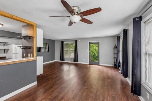 Spacious main floor featuring durable vinyl flooring.