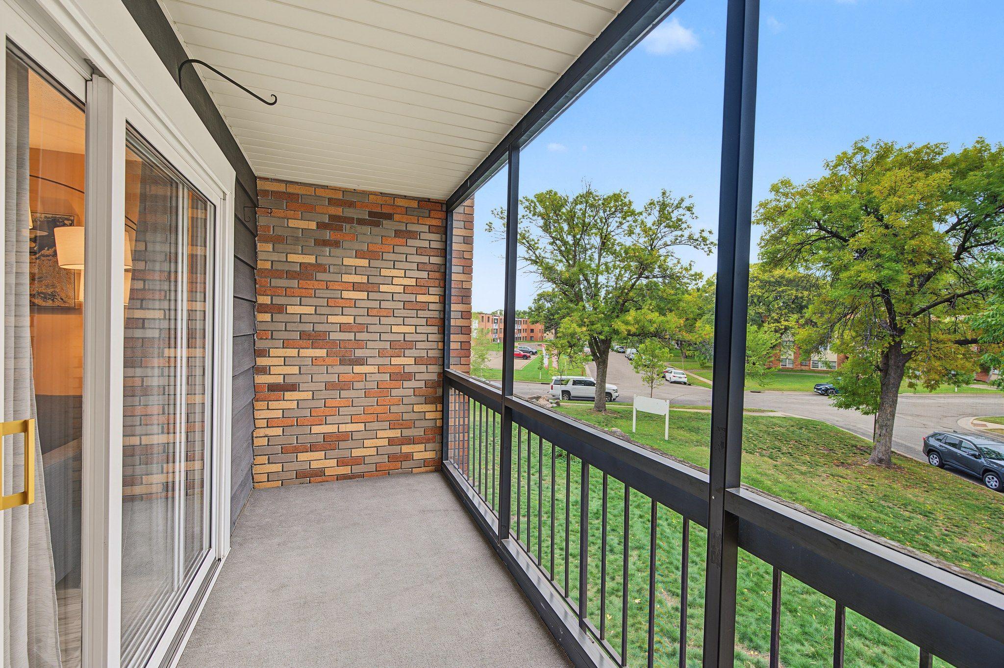 Enjoy your morning coffee on this Screened porch.