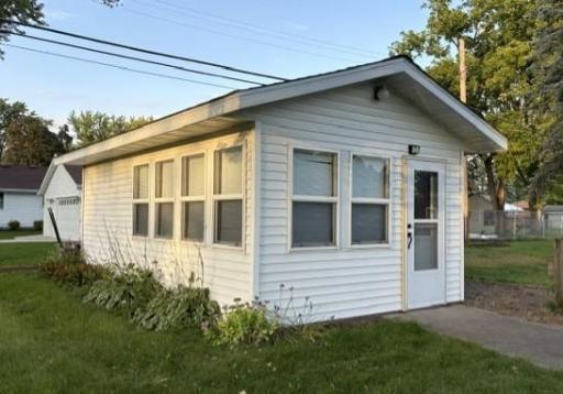 Adorable shed with electrical hookup in backyard