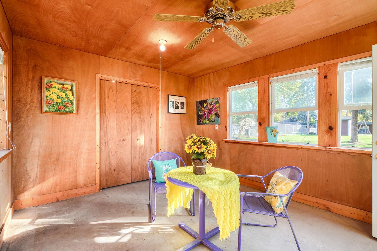 But wait! There's More! Interior of adorable garden shed in backyard.