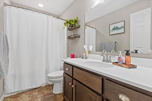 A full bath conveniently serves the main level.