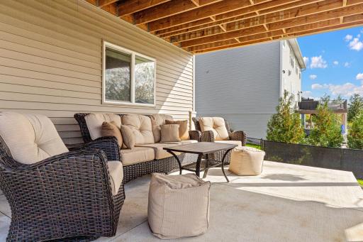 A covered patio creates a relaxed outdoor retreat.