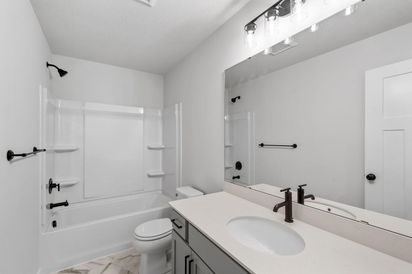 Photos are of a previously built home. Finishes will vary.