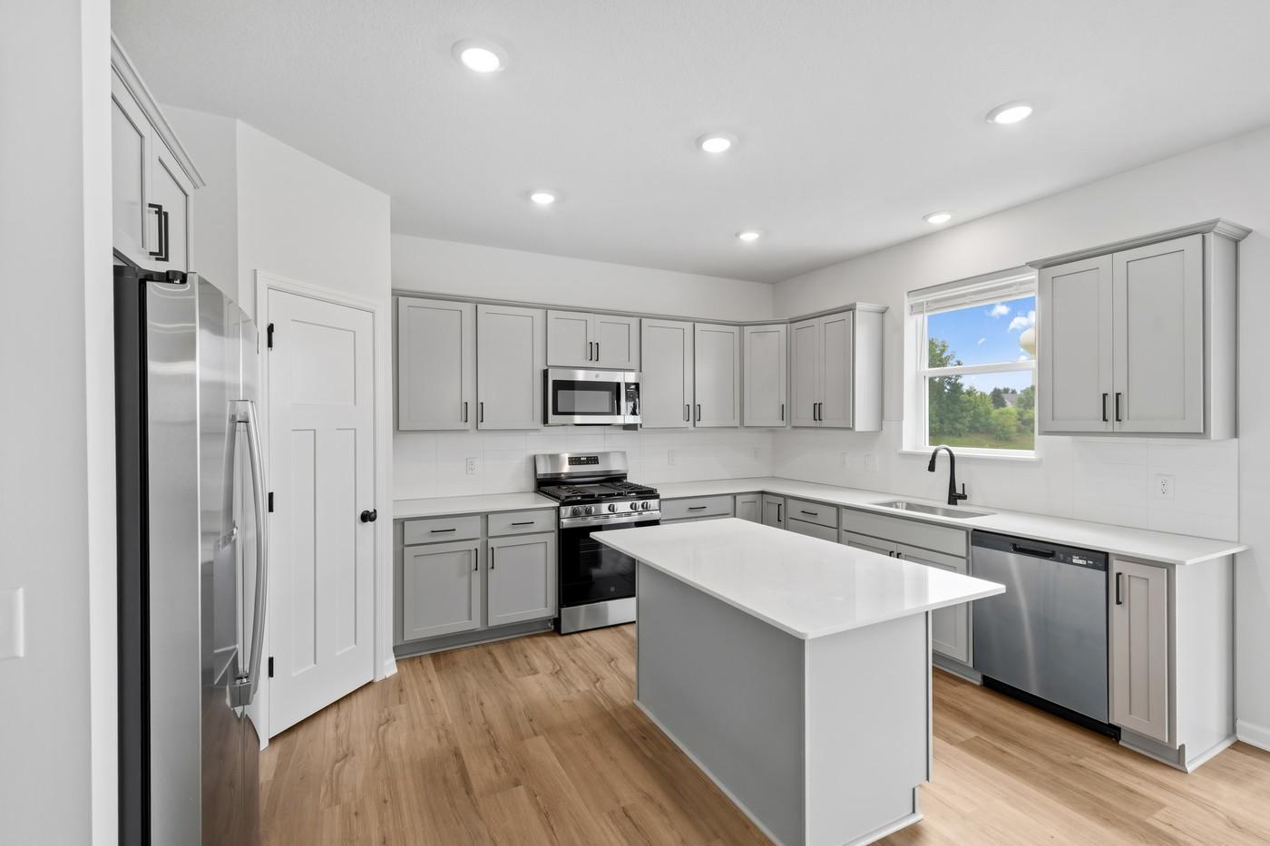 Photos are of a previously built home. Finishes will vary.