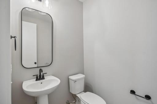 Tucked Away Powder Bath on Main Level For Convenience