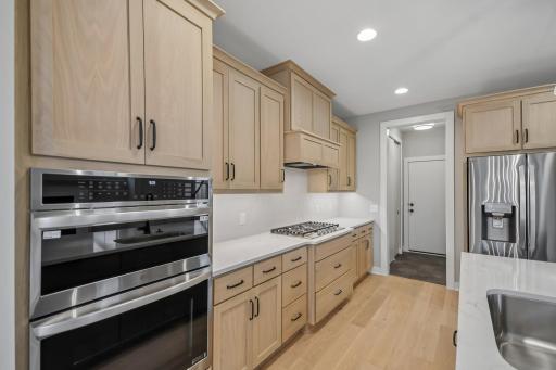 Natural Selections Create A Timeless Look, Equipped with a Oven Microwave Combo and 36" Gas Cooktop This Is a Kitchen You'll Want to Cook In