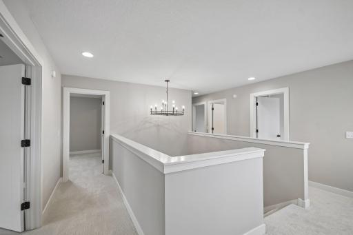 Second Level Landing Creates Openness Will Separating Spaces
