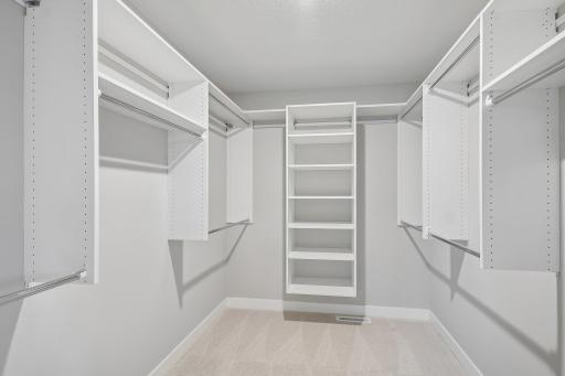 Primary Walk-In Closet with Melamine Closet Shelving System