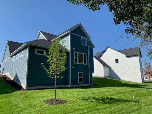 Walk out of your finished basement to your backyard. Landscaping, sprinkler system and sod newly installed!