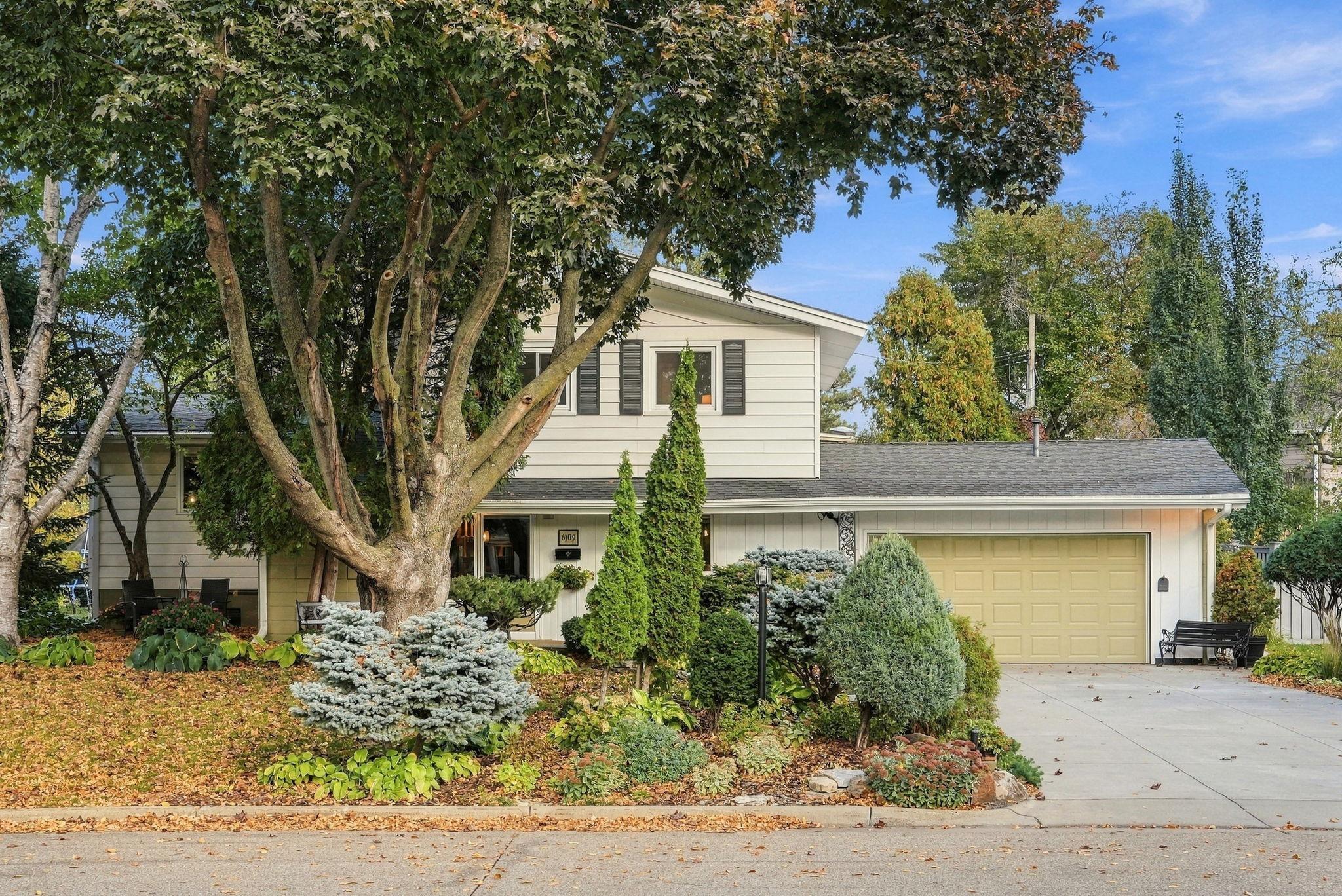 The landscaping at this home is park-like.