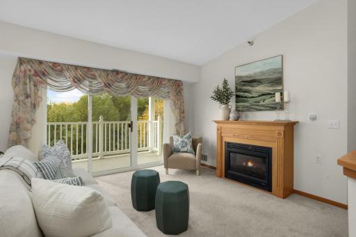 Enjoy relaxing evenings by the fireplace in your comfortable living spac