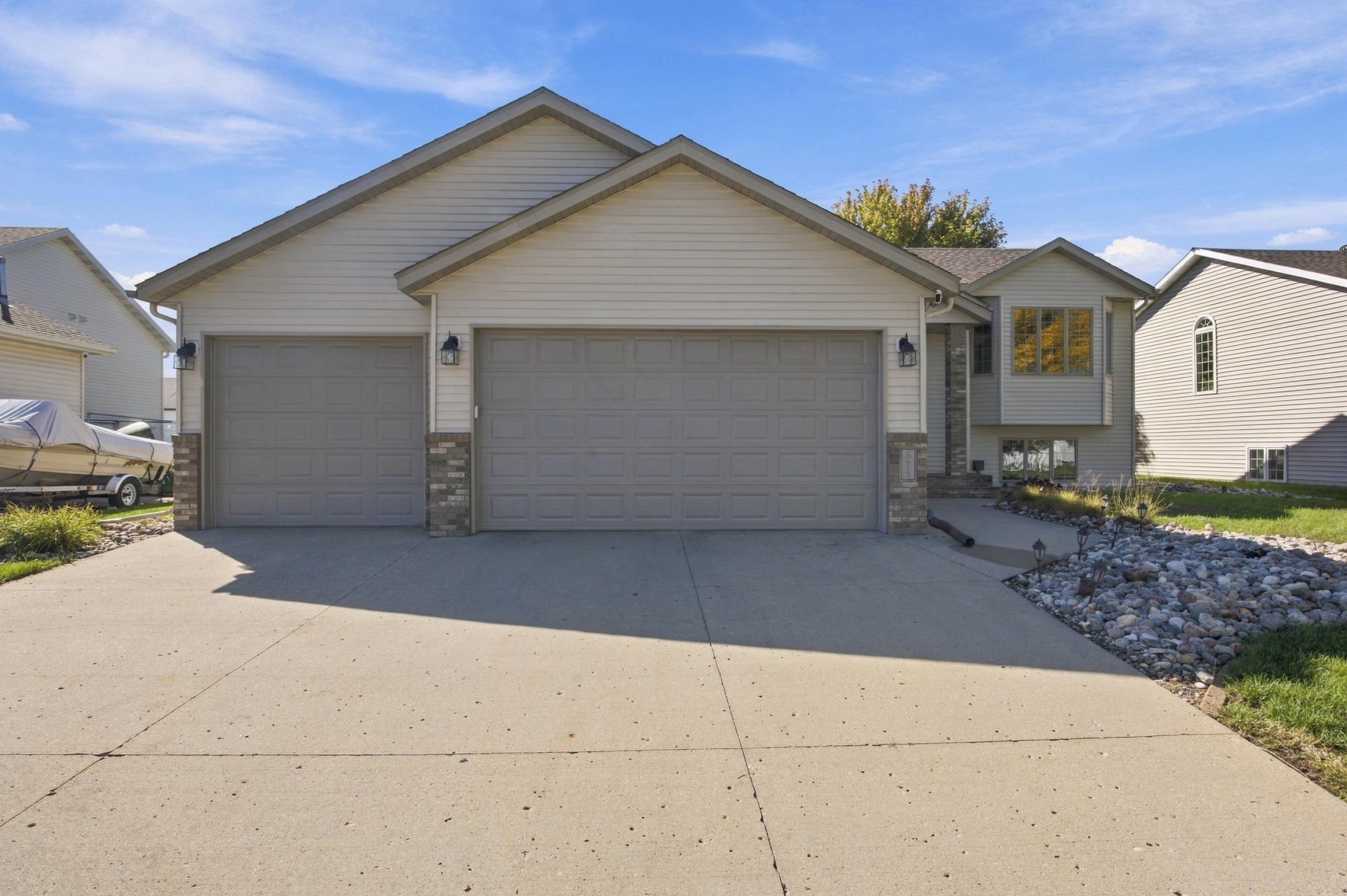 3-Stall Oversized Garage with Heat, Floor Drain & Hot/Cold Spigot; Additional Parking