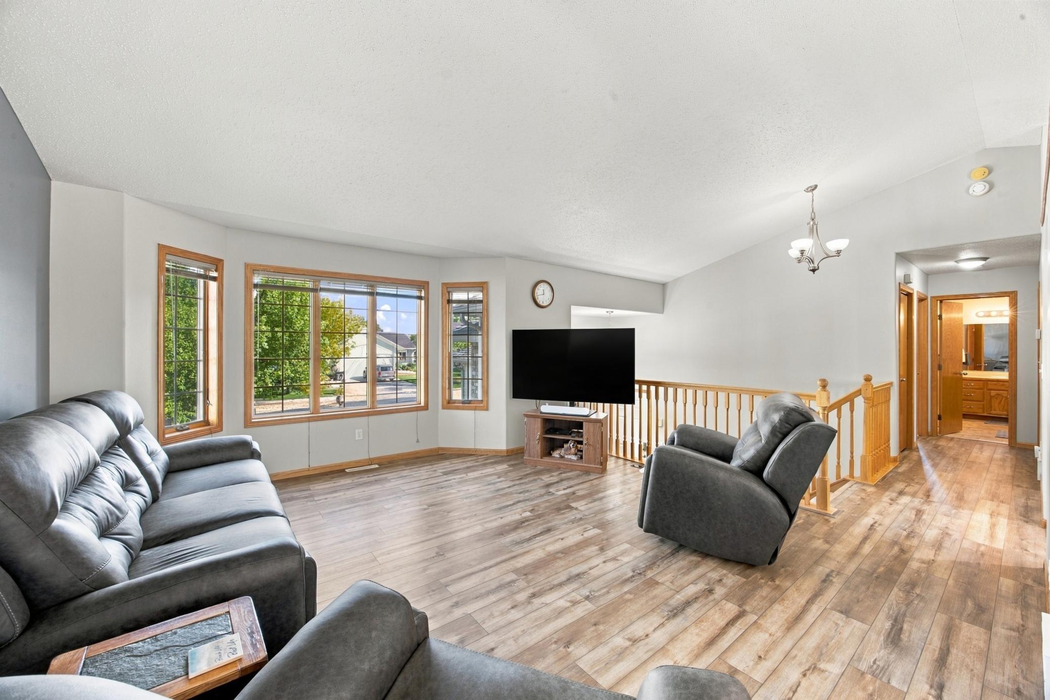 Upper Living Room with Natural Light; New LVP Flooring & Fresh Paint
