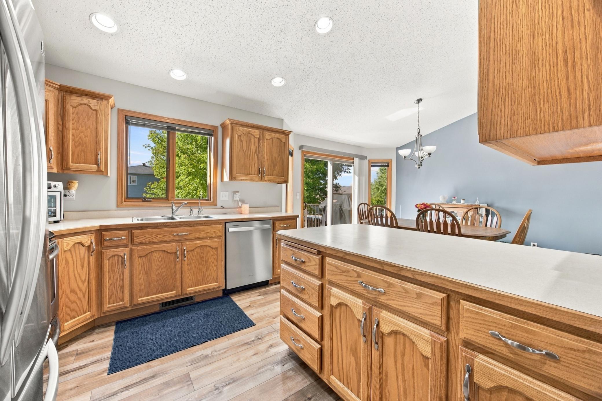 Kitchen with Window overlooking Backyard