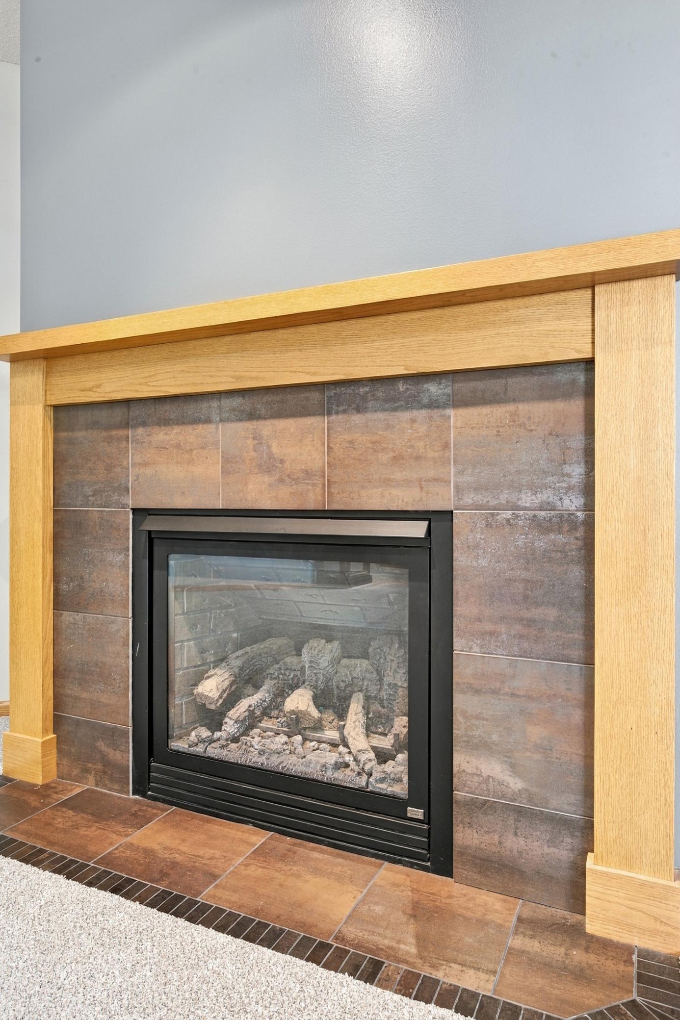 Lower Level Tile Surround Gas Fireplace