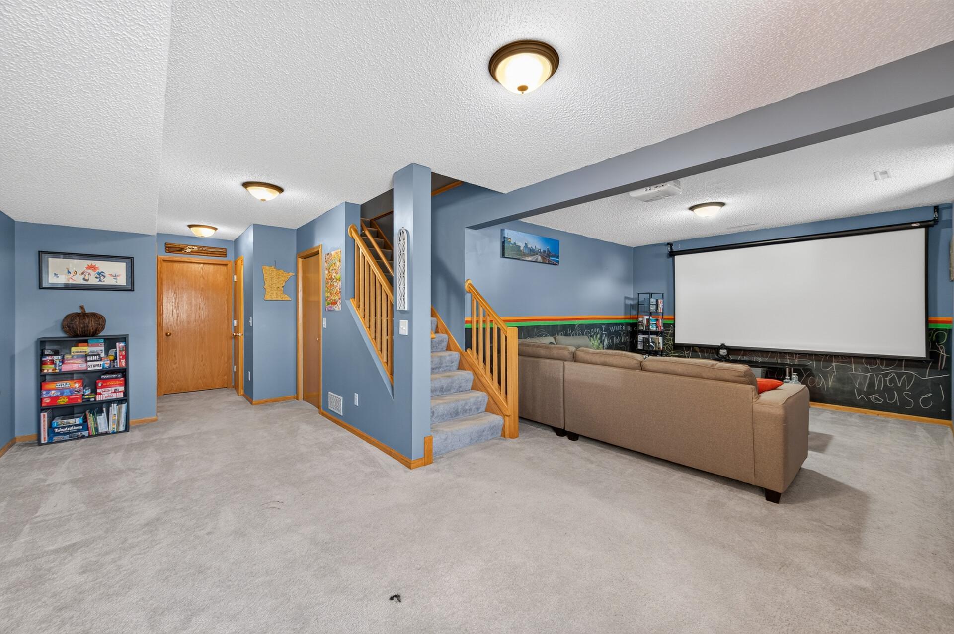 7623 Palomino Avenue NE - Lower Level Great Room and Family Room