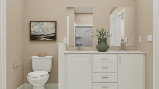 (Rendering, actual home's finishes will vary.) Easily balance shared routines with a convenient dual-sink vanity and a glass-enclosed shower